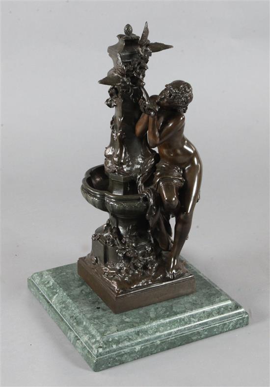 Mathurin Moreau (French 1822-1912). A bronze group of a girl beside a fountain